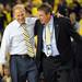 Michigan head coach John Beilein and athletic director Dave Brandon celebrate as they walk off the court after beating Syracuse 61-56 in the Final Four at the Georgia Dome in Atlanta on Saturday, April 6, 2013. Melanie Maxwell I AnnArbor.com